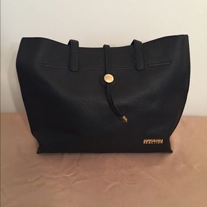 Black Kenneth Cole Reaction tote and wristlet
